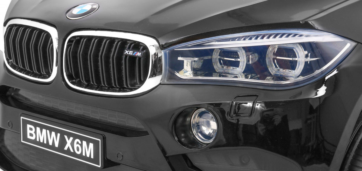 Licencirani auto na akumulator BMW X6M - crni/lakirani