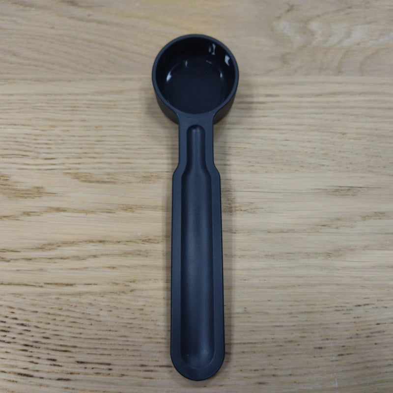Measuring spoon for ground coffee