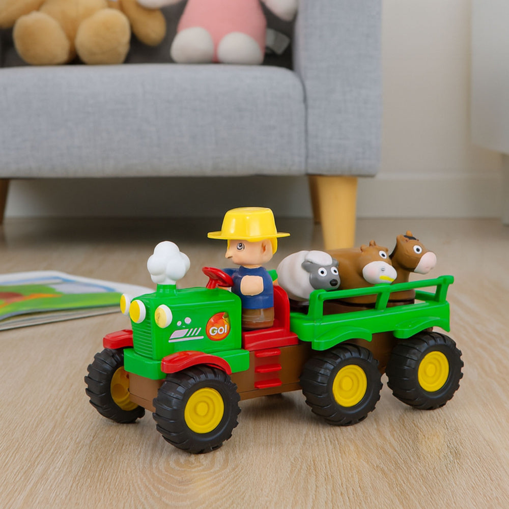 Edukativni traktor sa prikolicom i farmerom sa zvučnim efektima - village