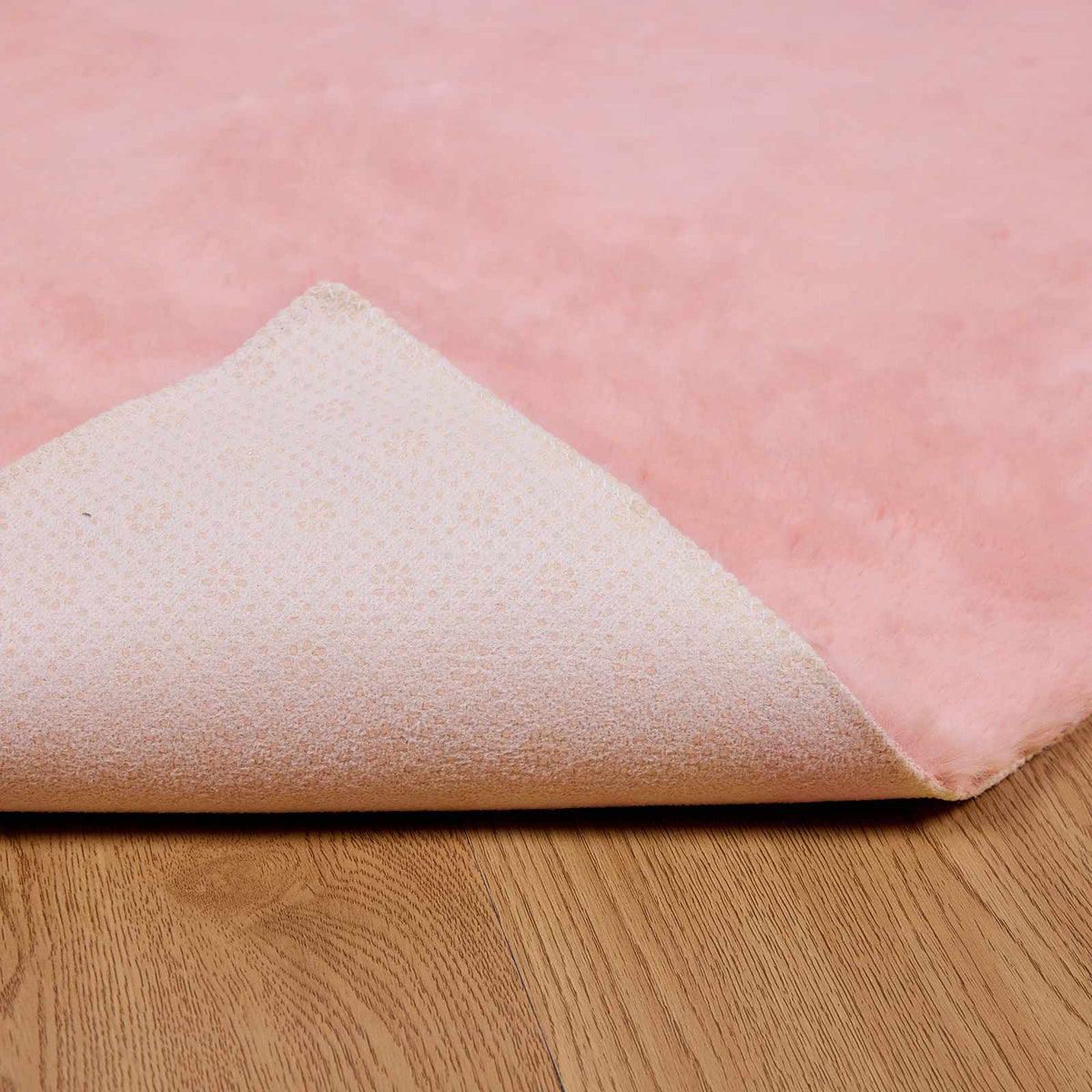 Protuklizni tepih od umjetnog zečjeg krzna OLITE Ružičasta 100 x 200 cm